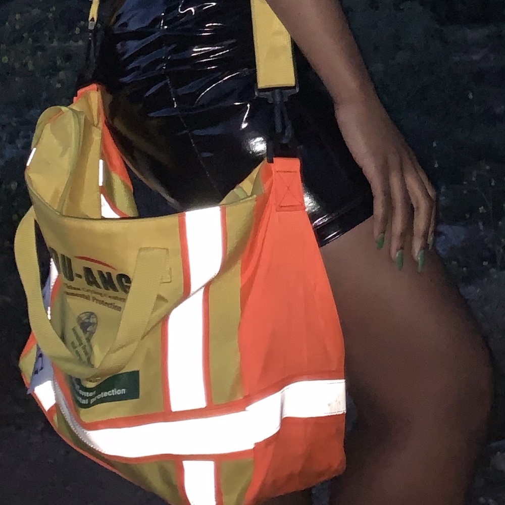 Glow in the dark construction fashion bag
